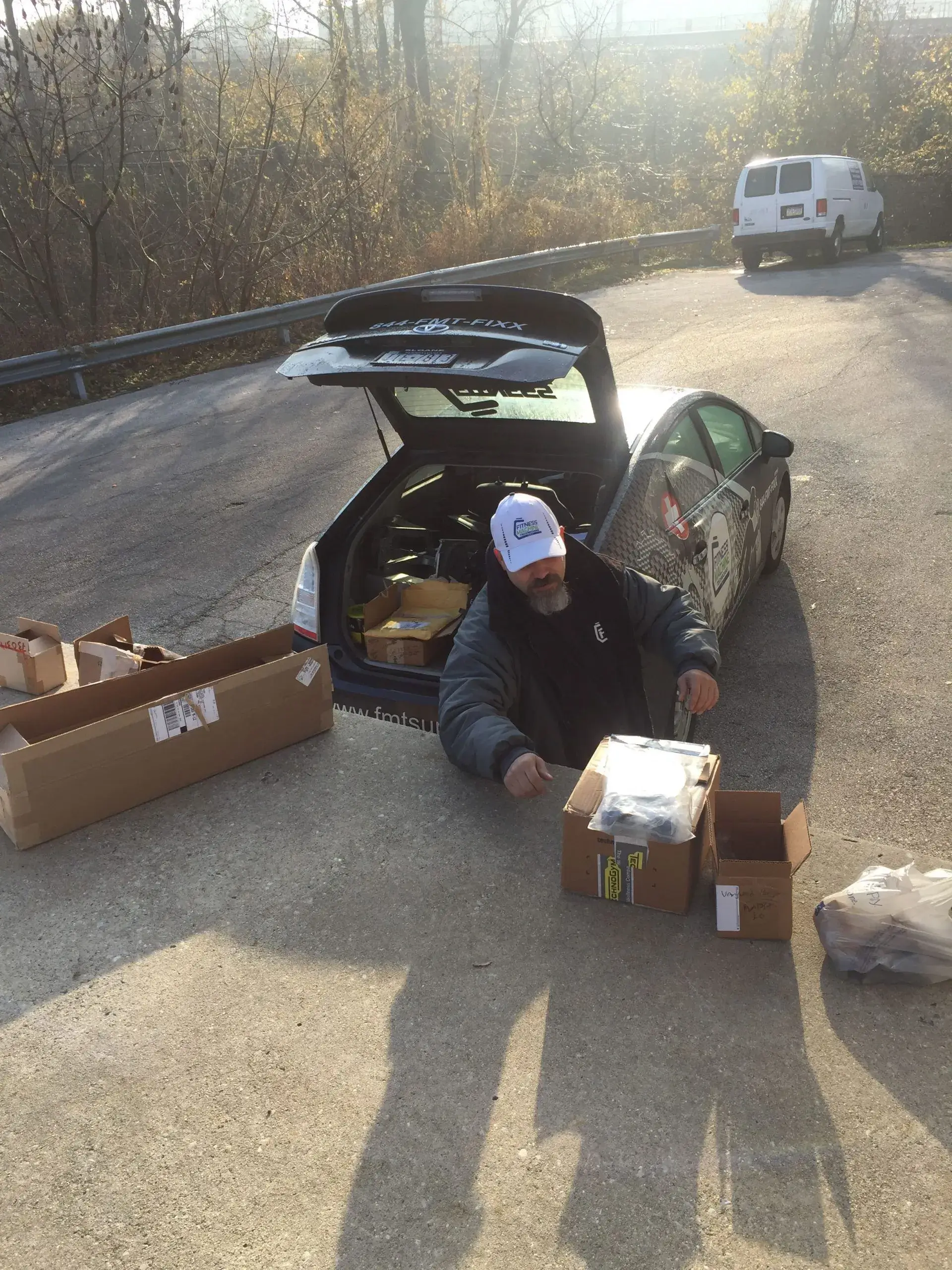 Bryan loading the car with parts for the day