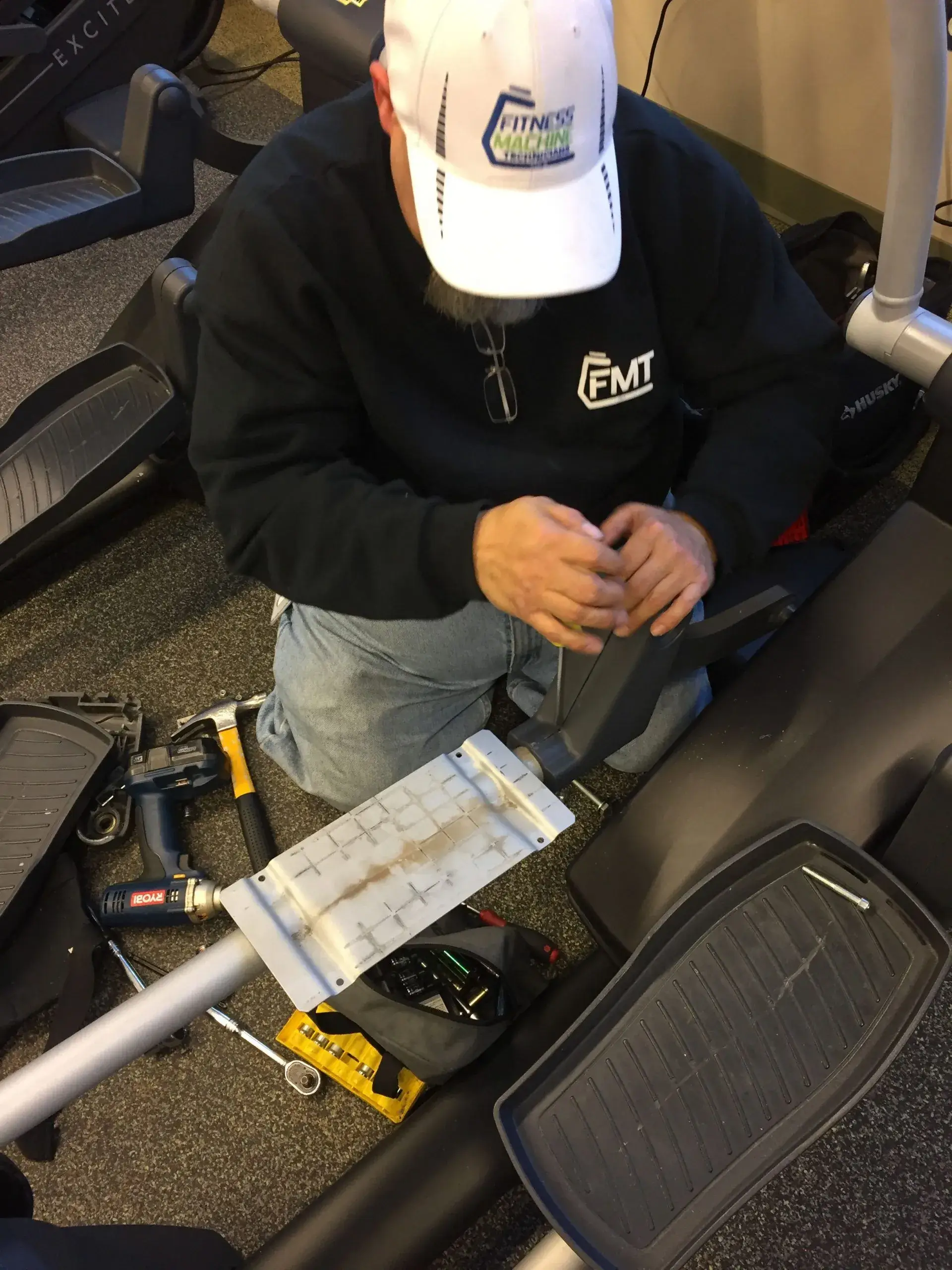 Bryan installing new parts on the machine