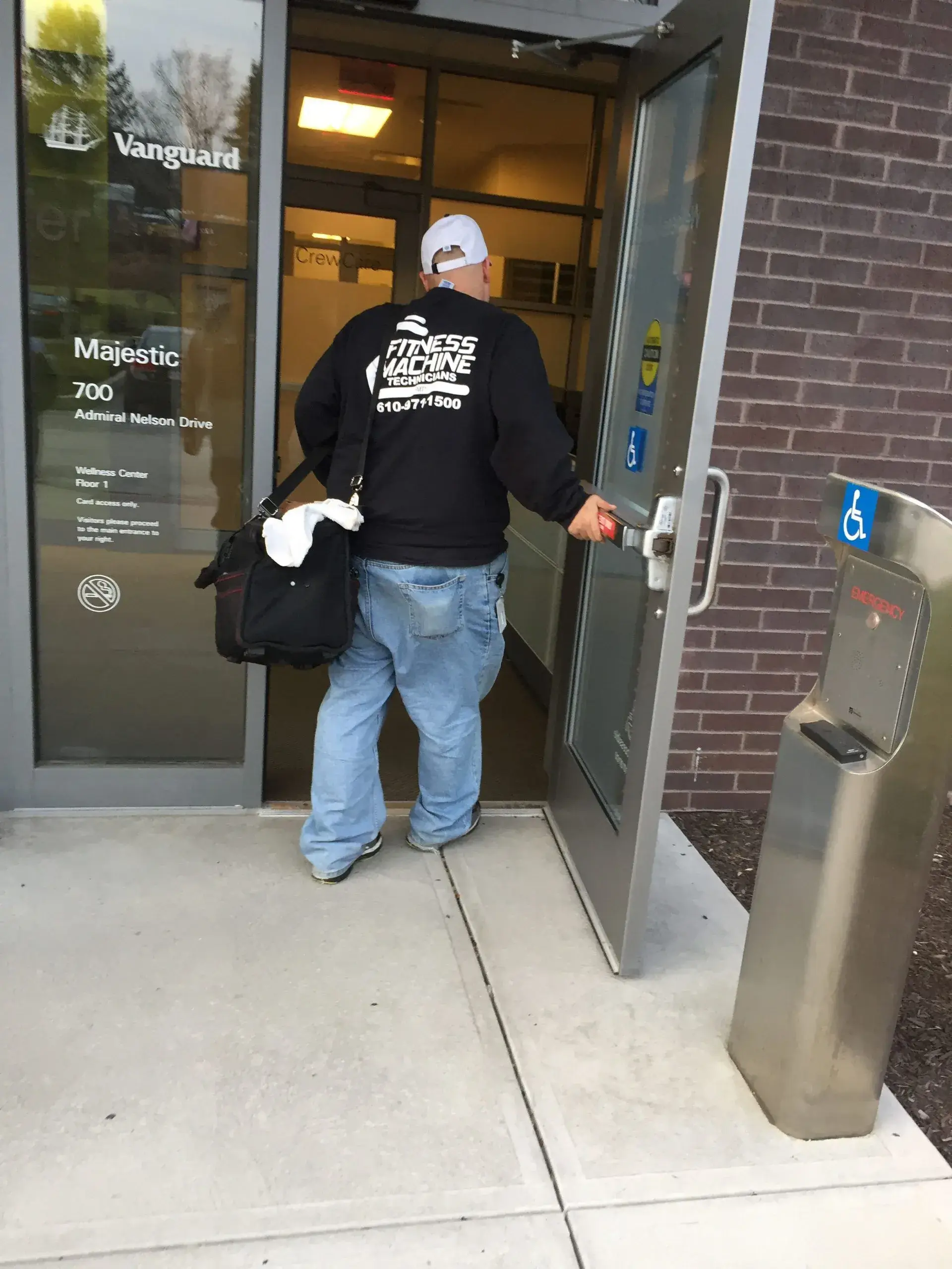 Bryan walking into the client's location