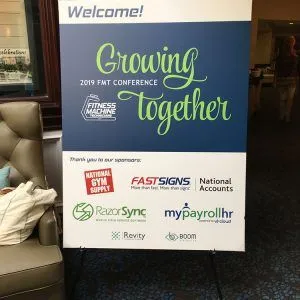 A welcome banner for the 2019 FMT Conference on an easel